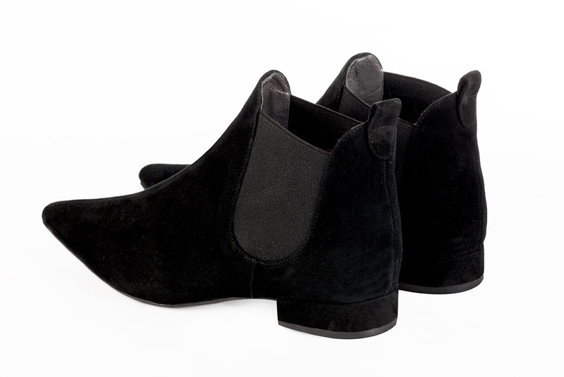Matt black women's ankle boots, with elastics. Pointed toe. Flat block heels. Rear view - Florence KOOIJMAN